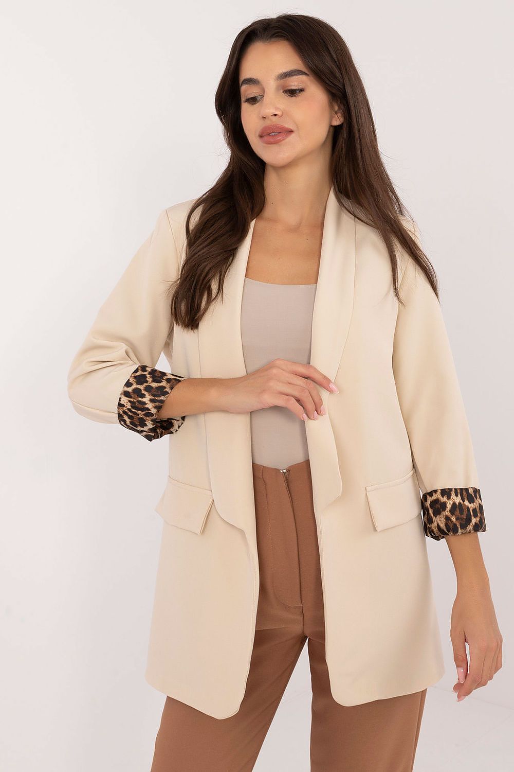 Front view of Elise Women’s beige elegant casual jacket with lapels and open front.