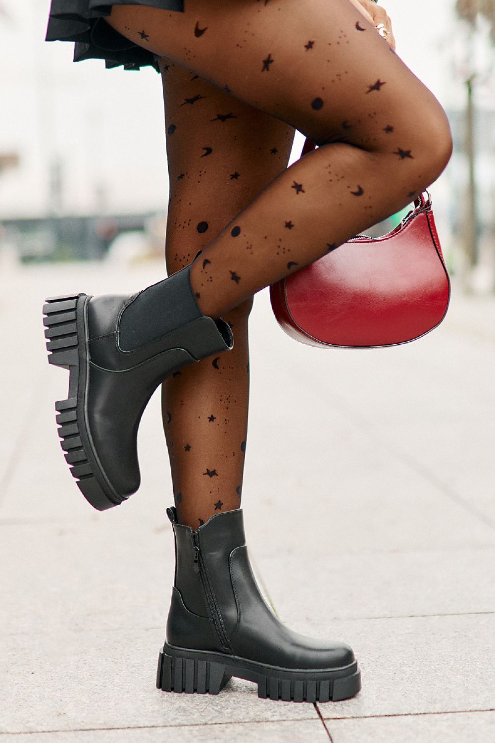 Warm lined women’s eco leather booties on flat heel, perfect for colder days.