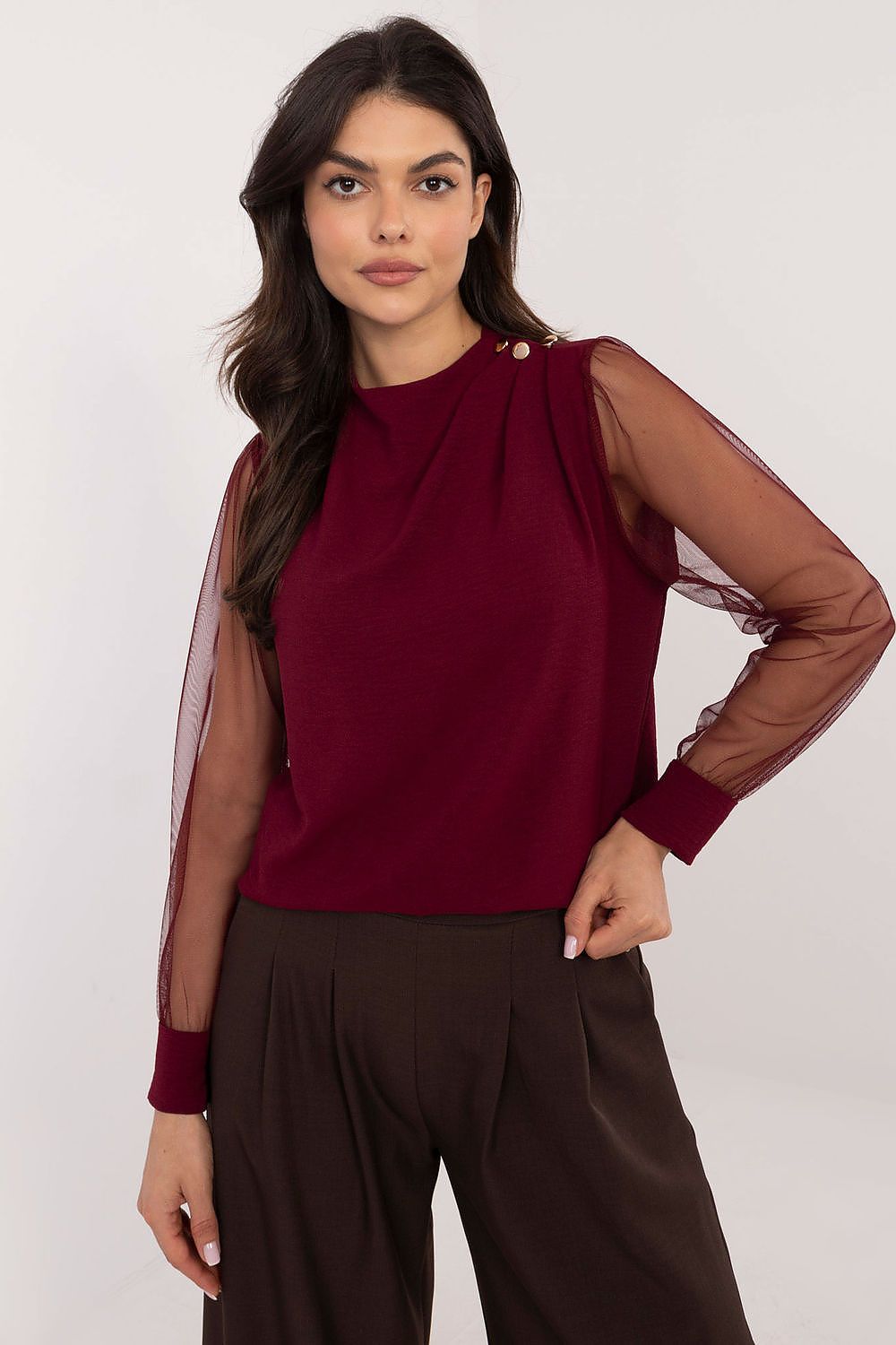 Red elegant women’s blouse with sheer mesh sleeves and round neckline — front view.
