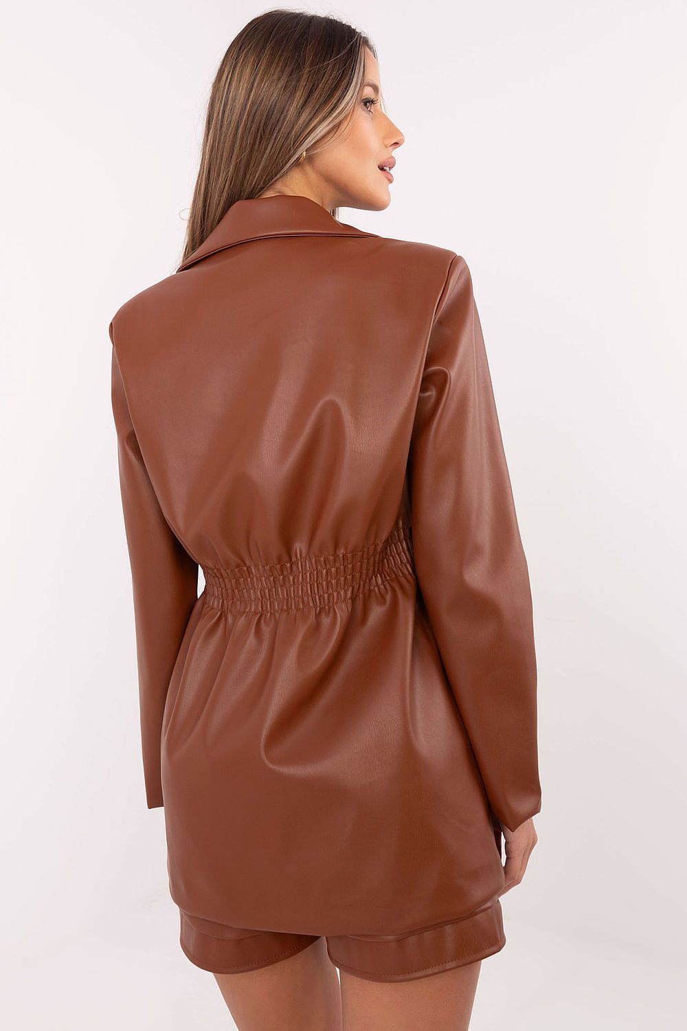 Back view of eco-leather blazer jacket with tailored cut and decorative waist details.