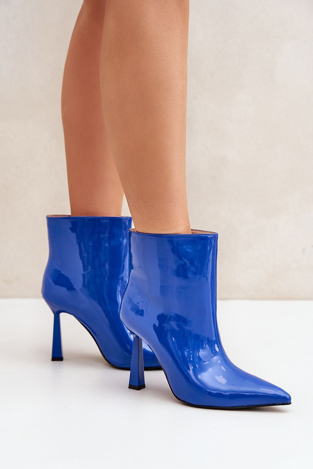 Sleek Gloss Patent Ankle Boots in Blue – Front View 1