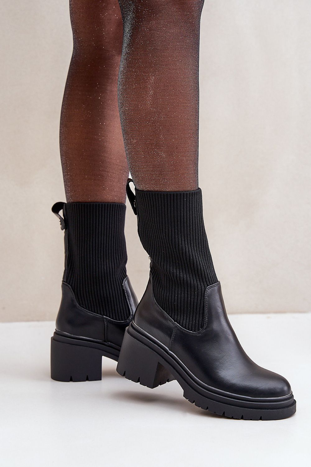 Chic sock-like ankle boots with rounded toes and stable heel – side view