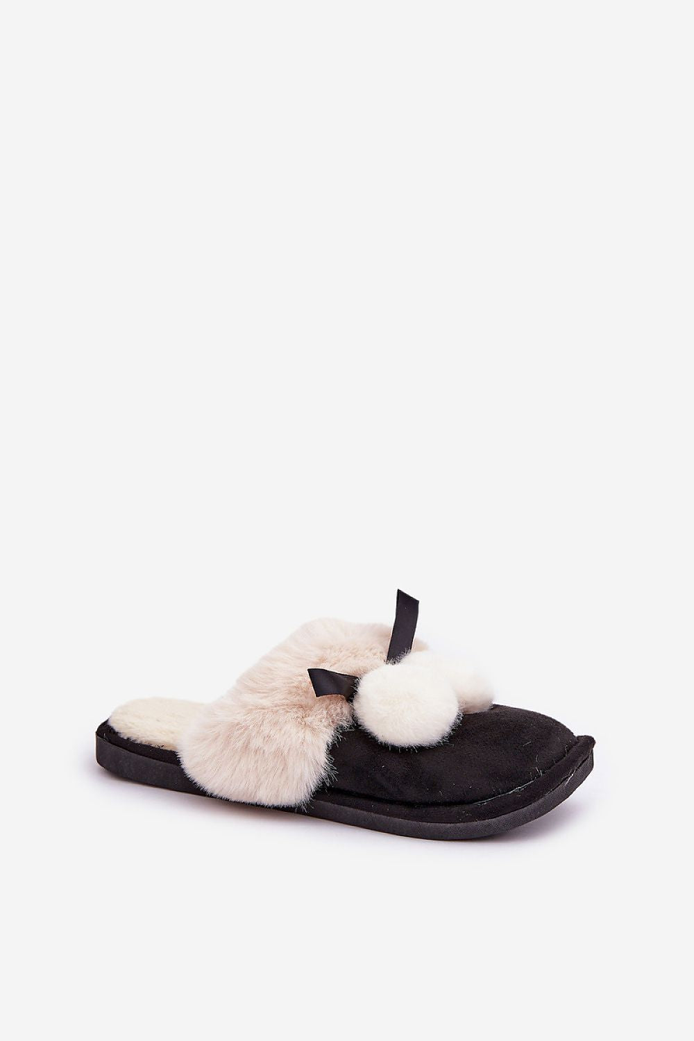 Black slipper with white fur pom-poms on a white background