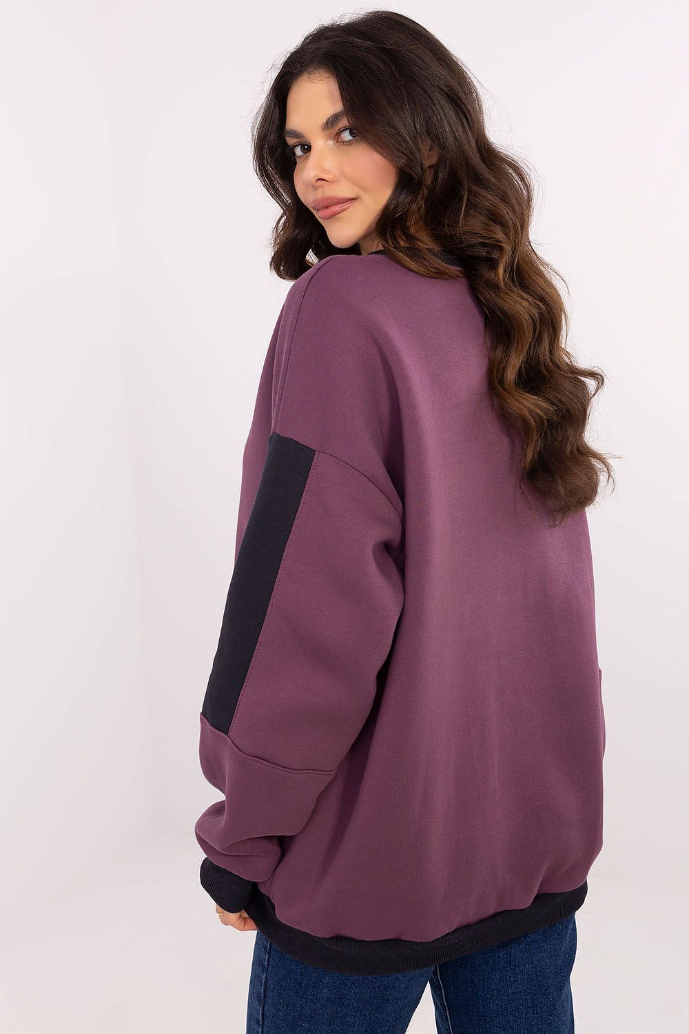 Warm violet pullover sweatshirt with decorative patches and smooth finish.