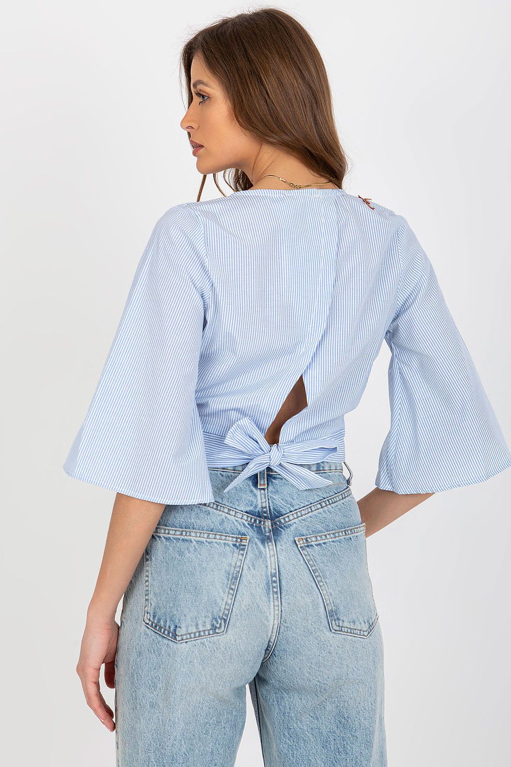 “Cotton Bloom Blouse in Blue with sweetheart neckline, back view”