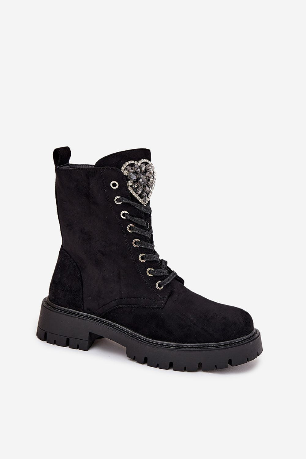 Detail shot of eco-leather texture and cozy lining in Black-2 women’s ankle boots. 3
