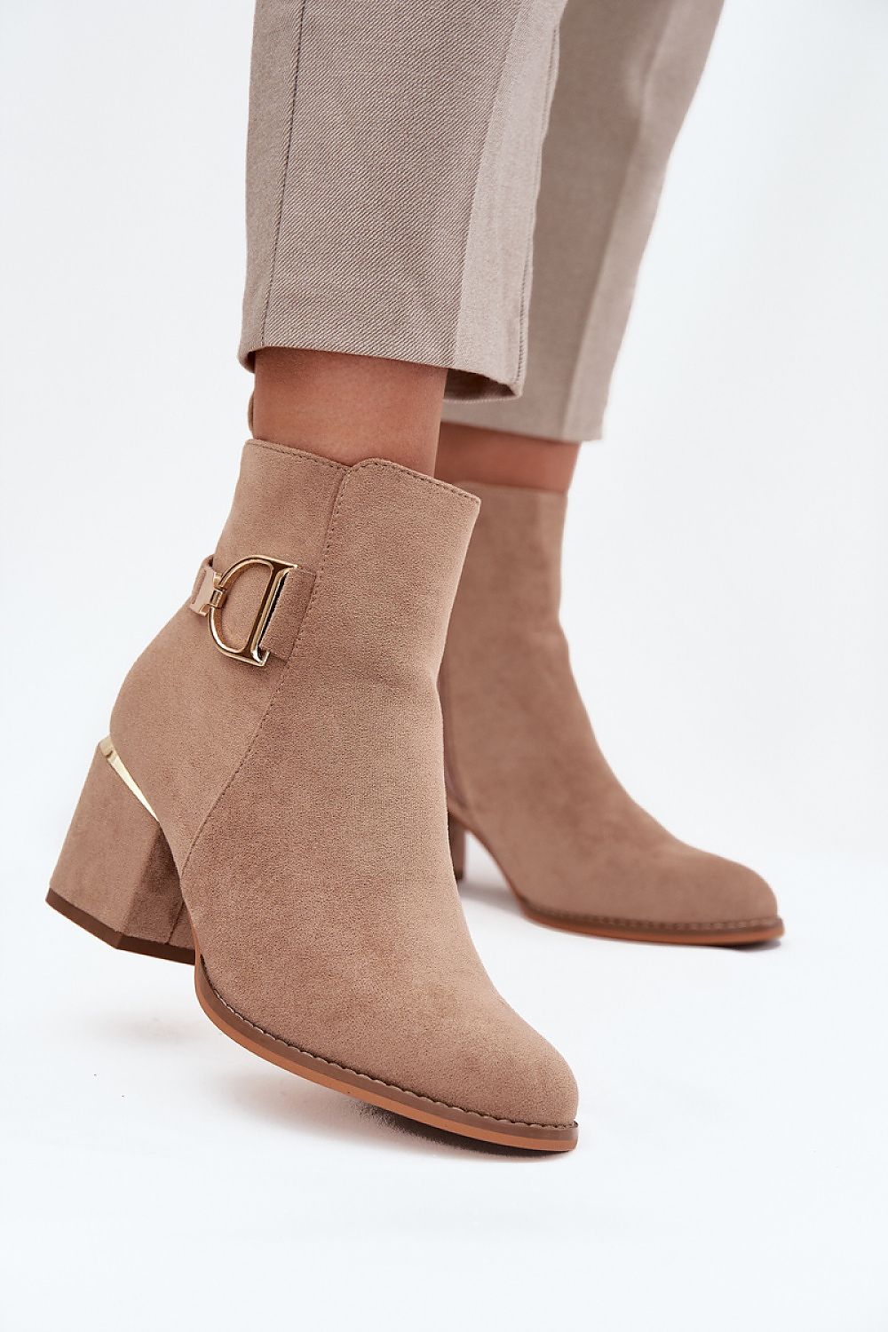 Elegant faux suede ankle boots with rounded toe and side zipper – angled view