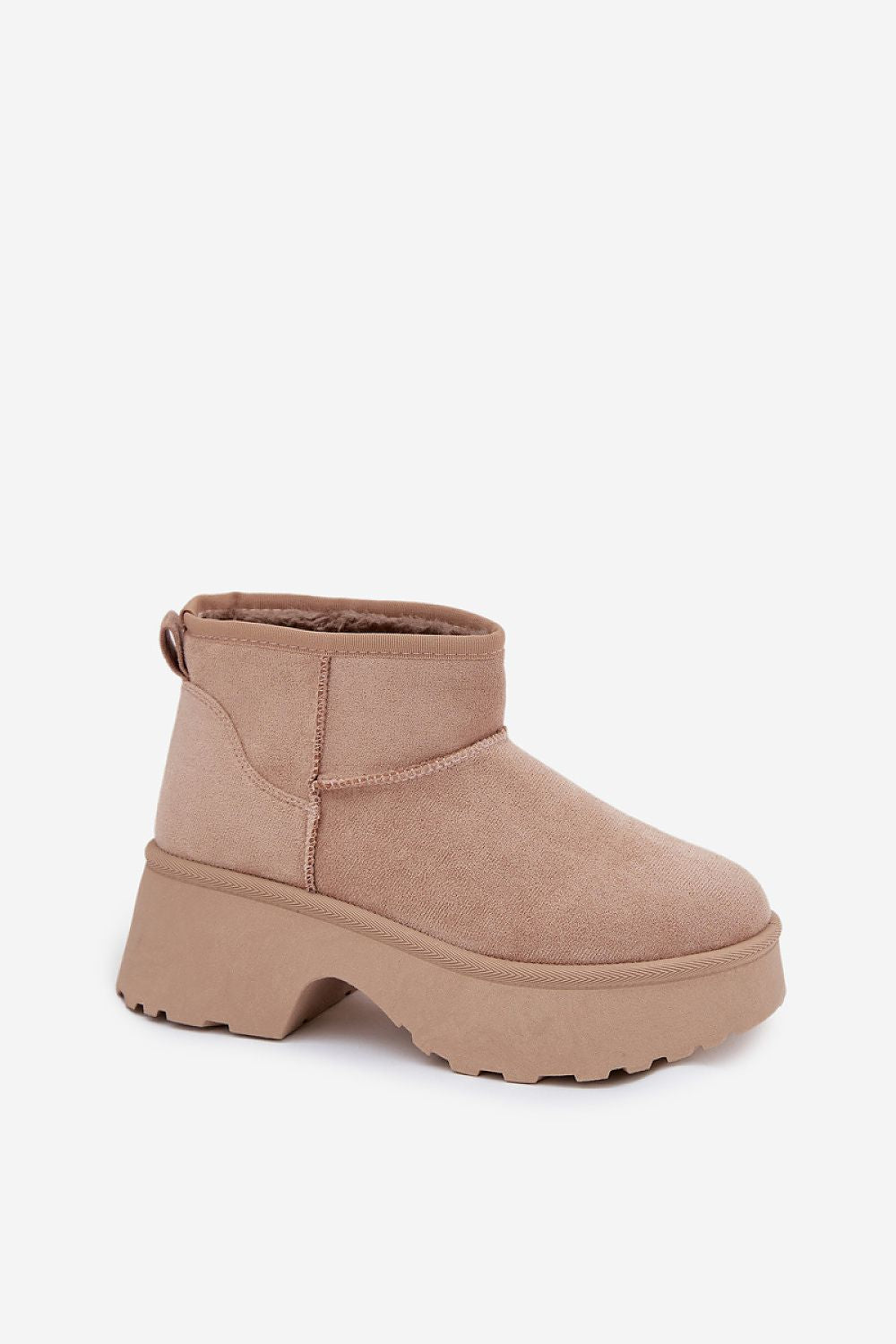 view of women’s winter snow boots with platform sole and faux suede finish.