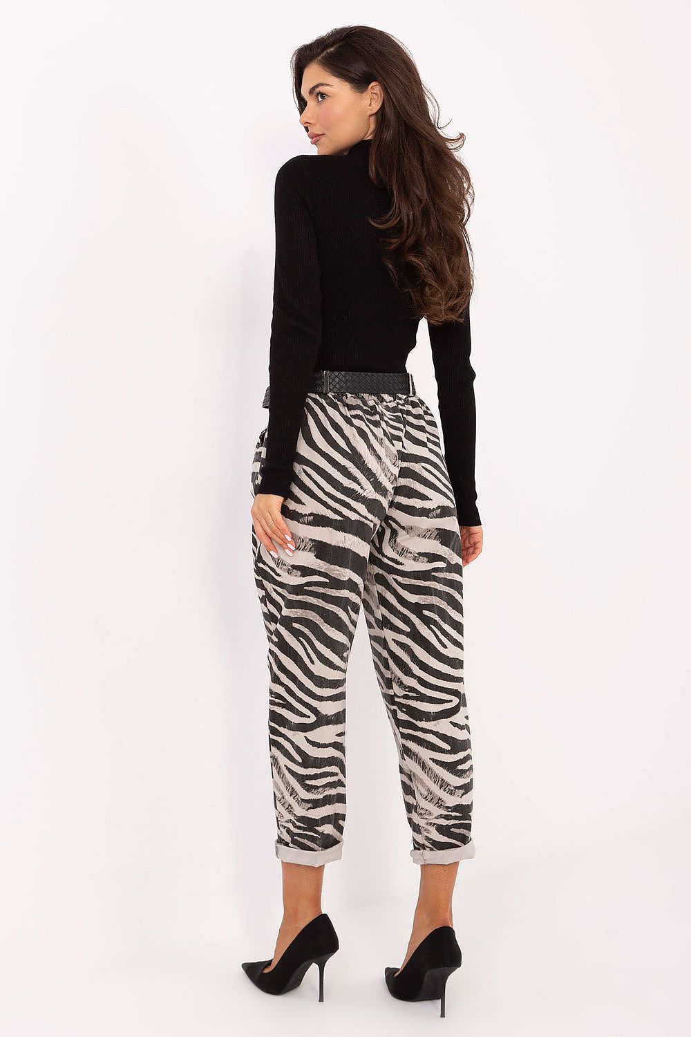 Back view of zebra print trousers showing tapered leg fit and comfortable design.