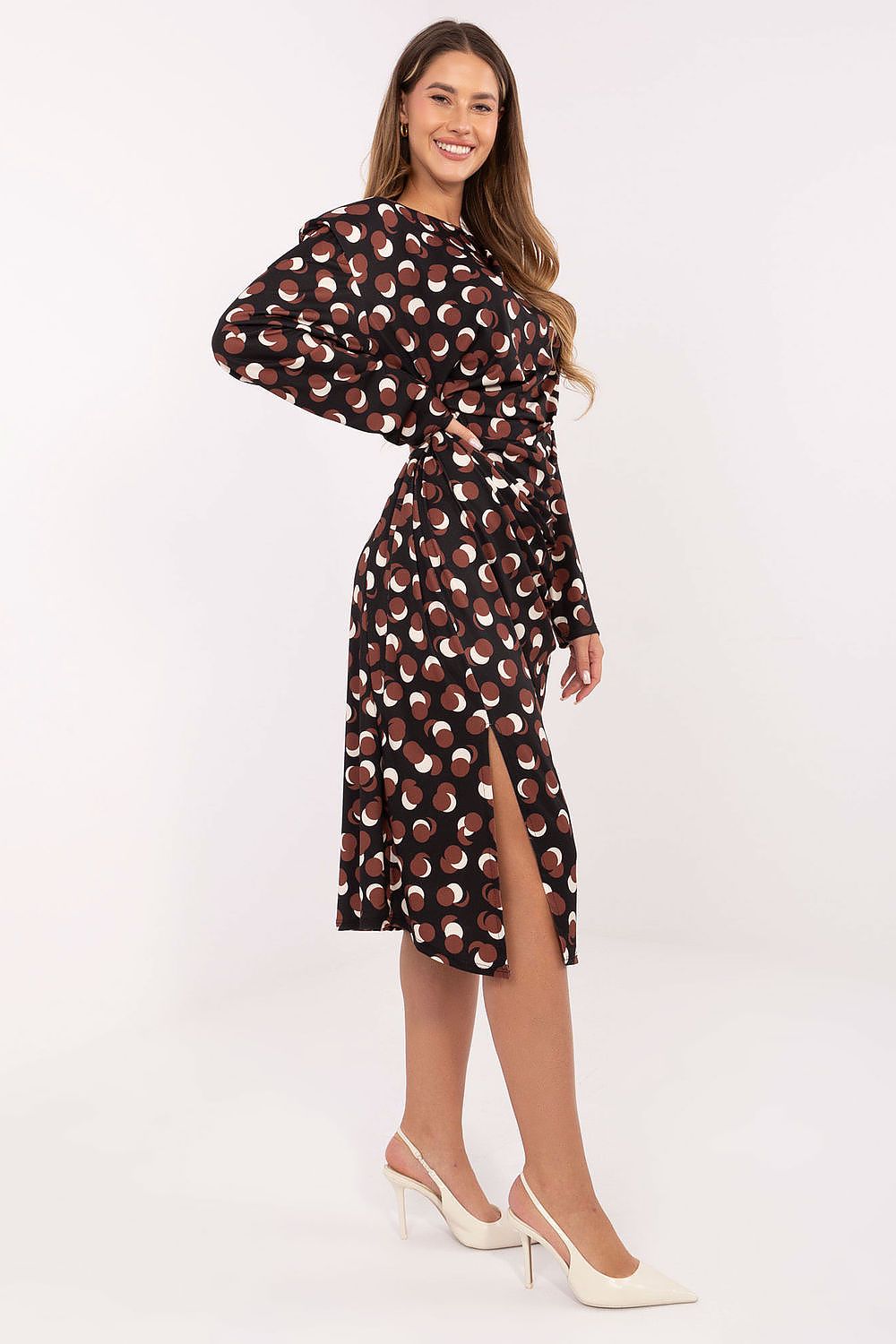 Side view – Geometric print midi dress with ruching and shoulder pads for a flattering silhouette.