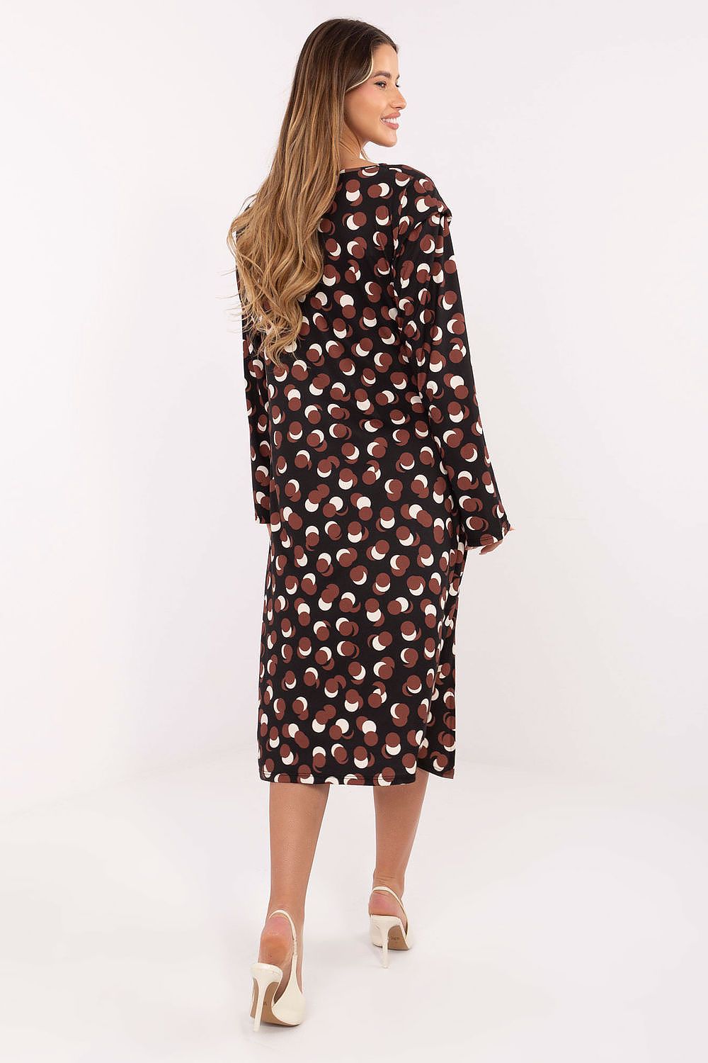 Standalone image – Women’s geometric midi dress displayed on a white background showing draped waist detail.