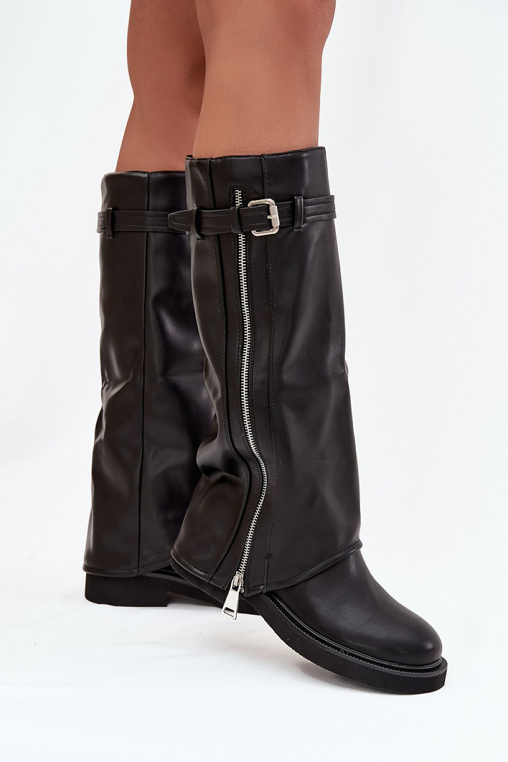 Side view showing folded shaft, flat heel, and decorative zipper accent.