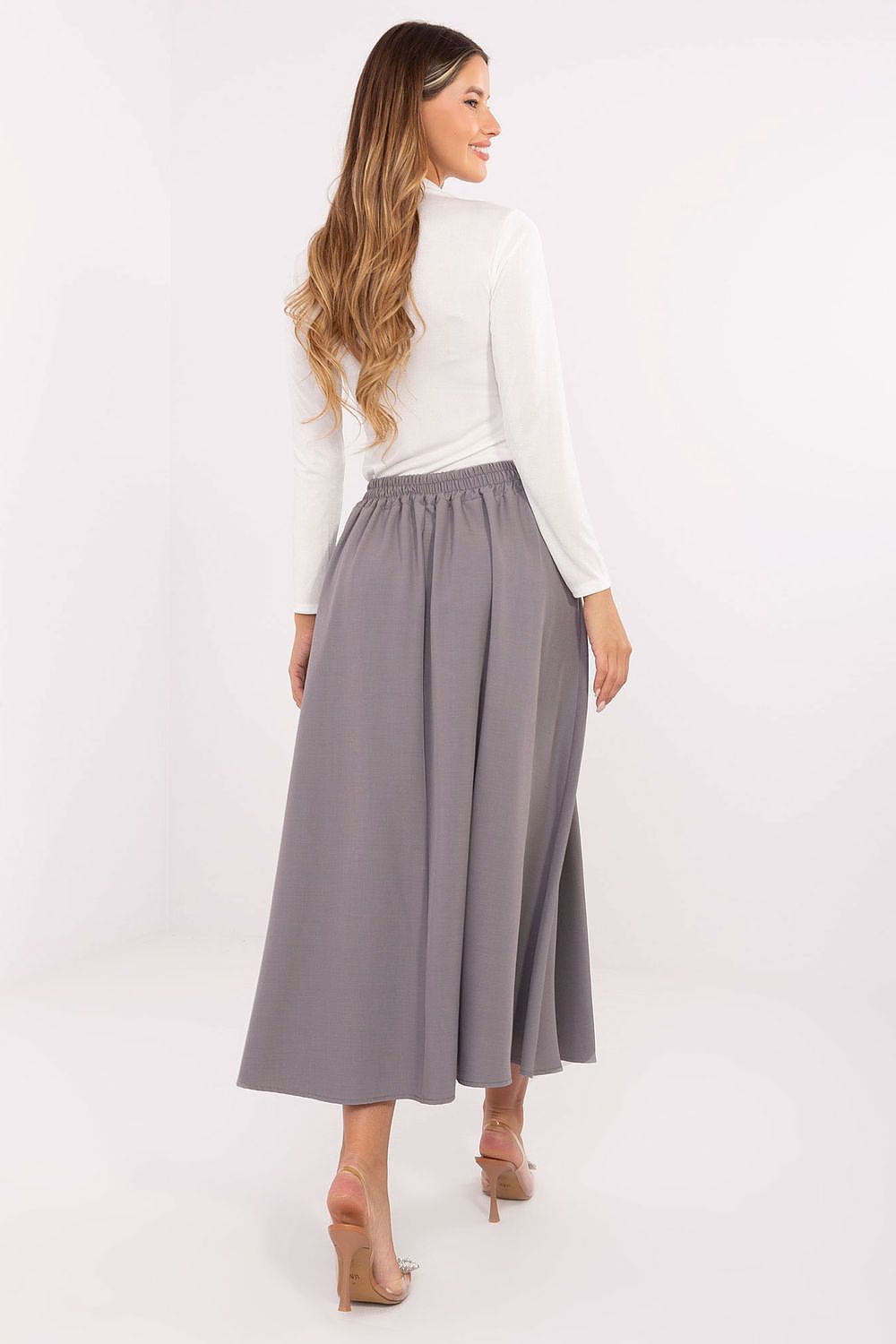 Classic pleated midi skirt showcasing smooth texture and decorative button – back view.