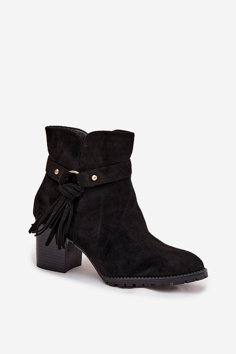 Close-up of black fringe strap detail on eco-suede ankle boots