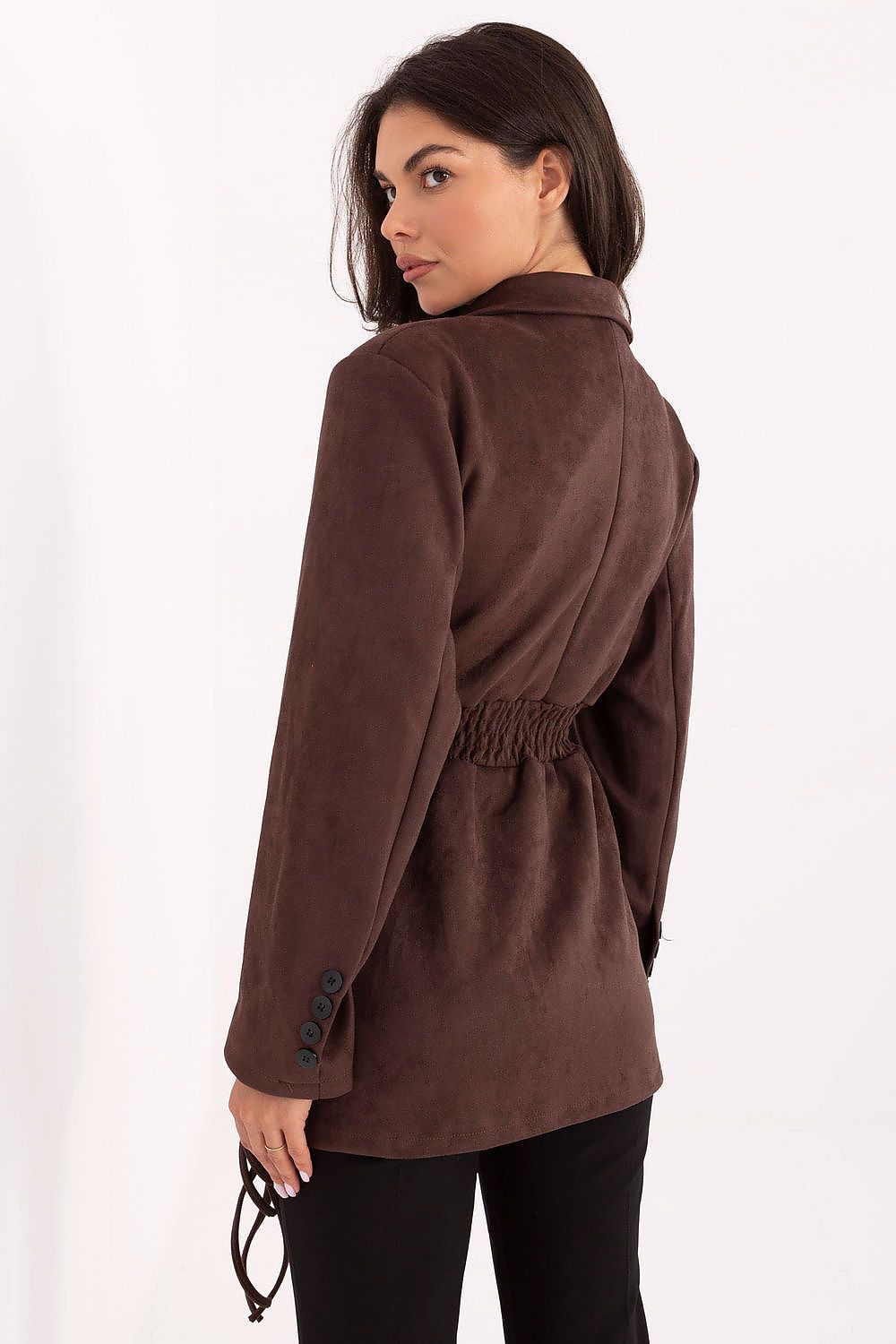 Back view of suede blazer showing pleated waist detail