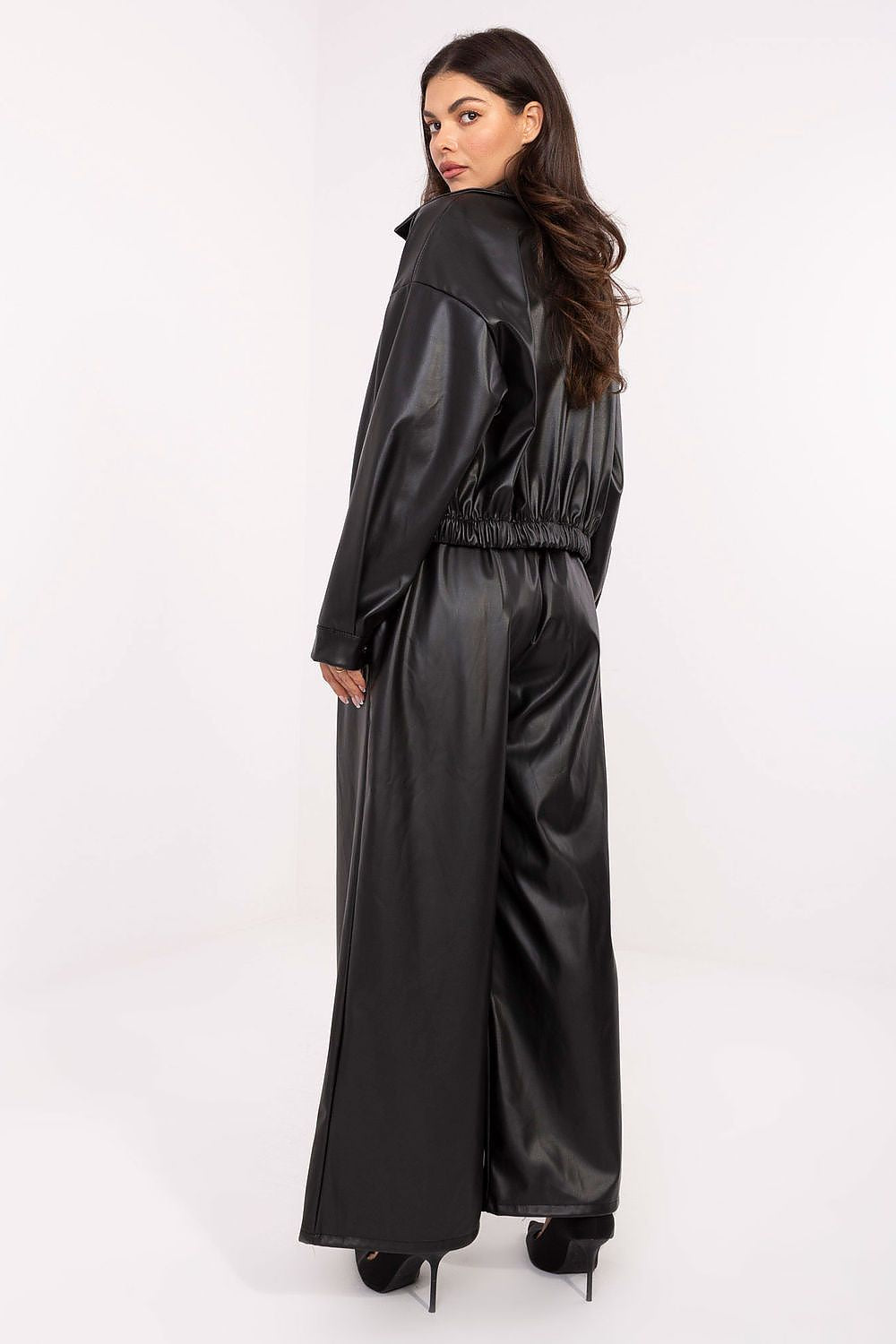 Elegant eco-leather pants with elastic waistband and side pockets in black