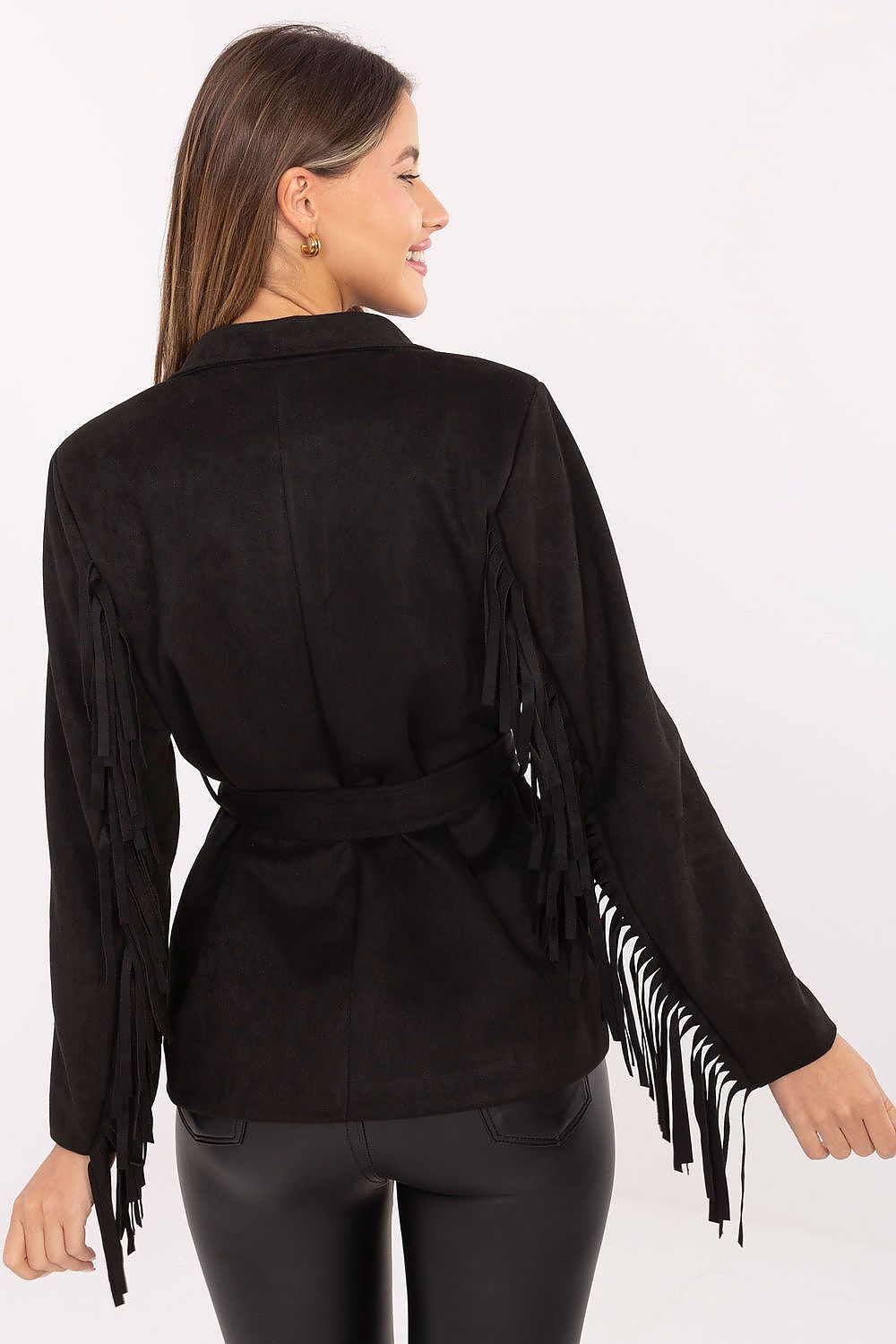 Close-up of blazer fringe and button closure details in black