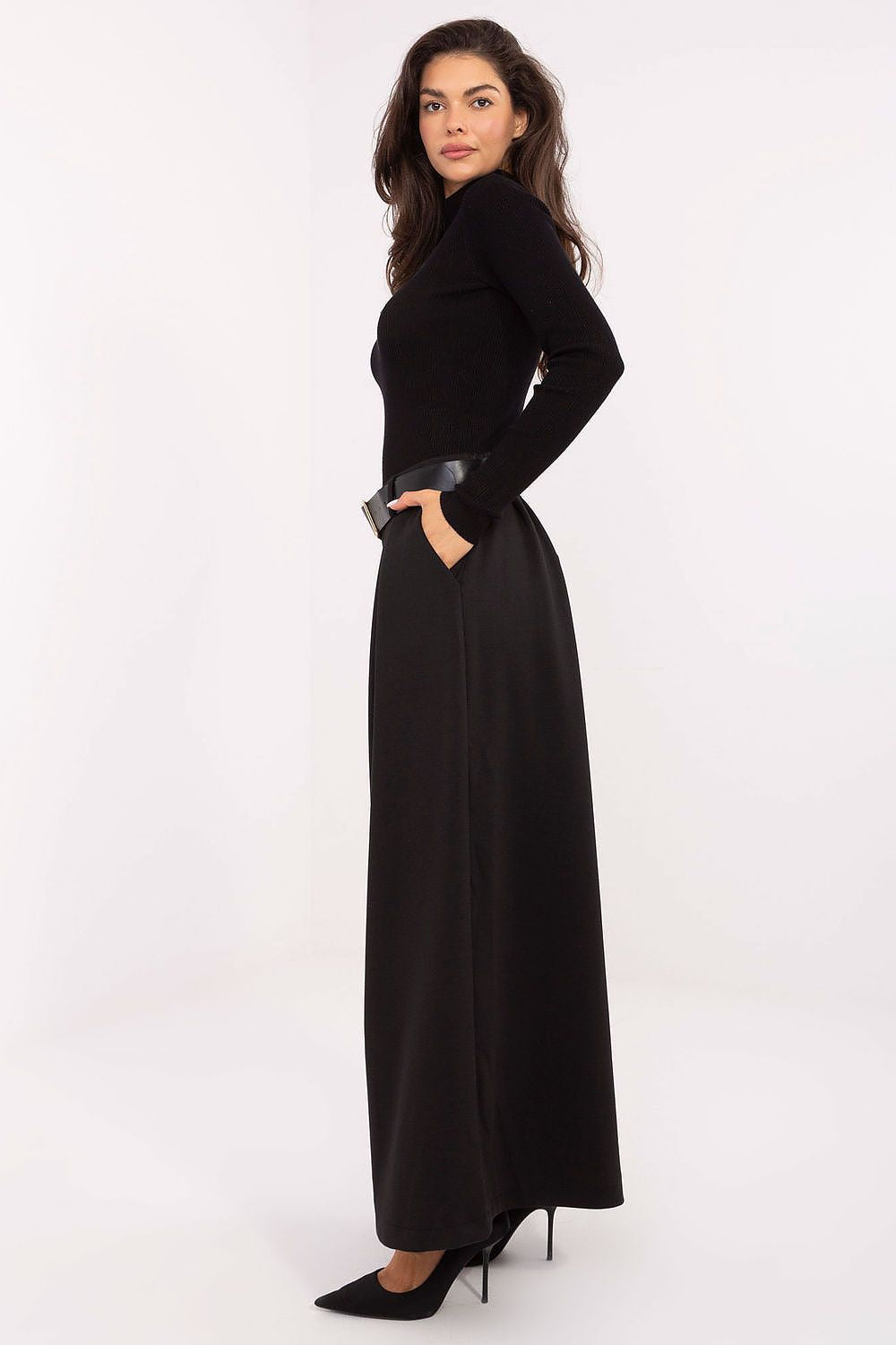 Side view highlighting flowing silhouette and functional side pockets in black