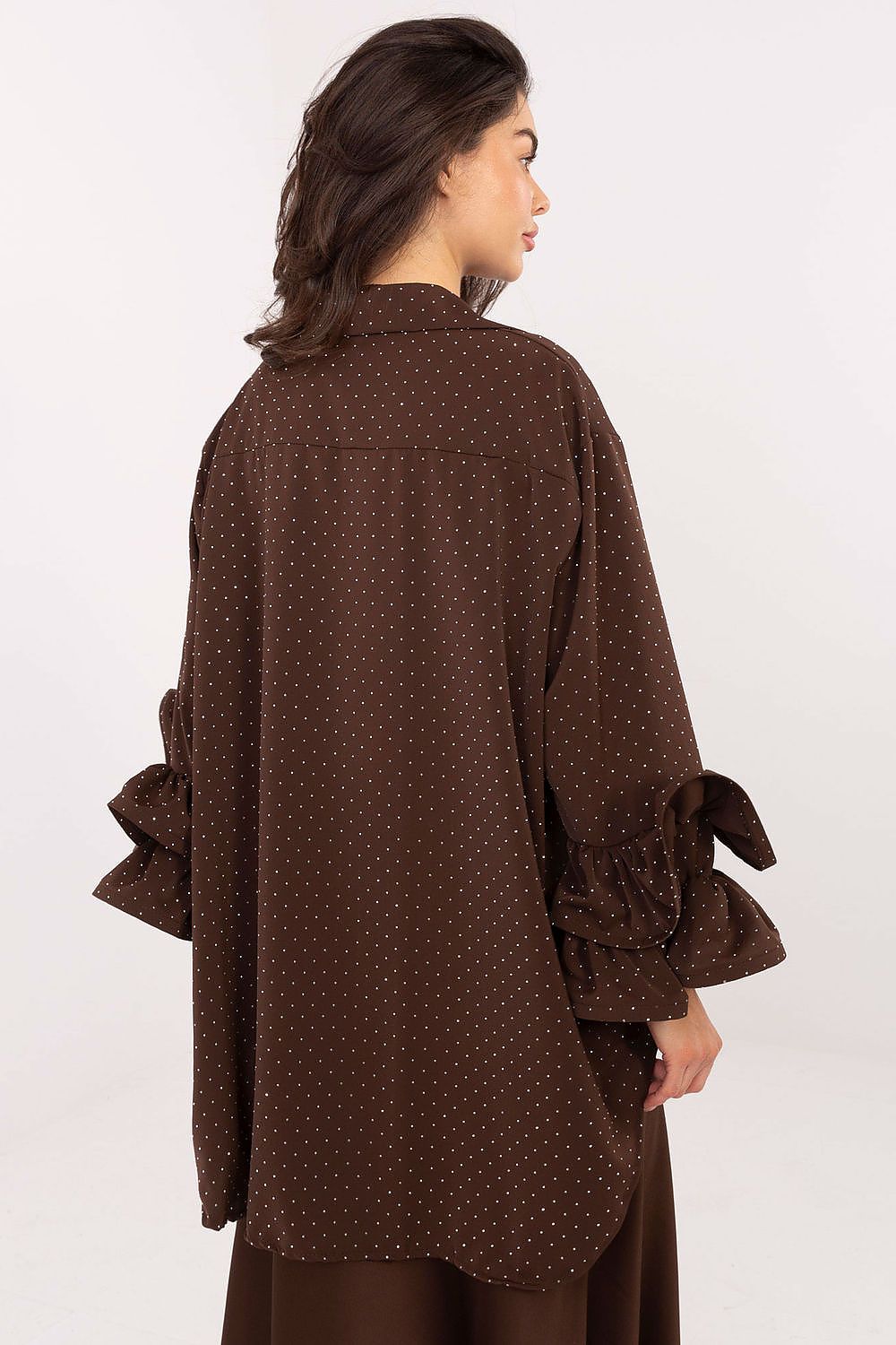 Brown party shirt with elongated back and shiny jet decoration – side angle.