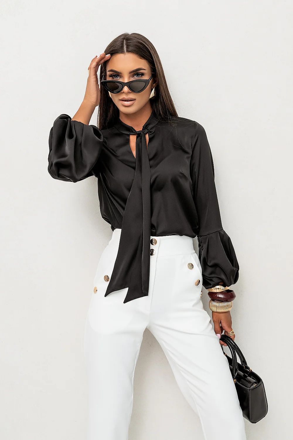 Model in a black satin VIVIENNE shirt with a luxurious polished shine.