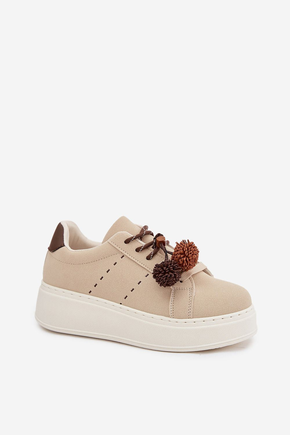 Beige sneaker with brown accents on a white background