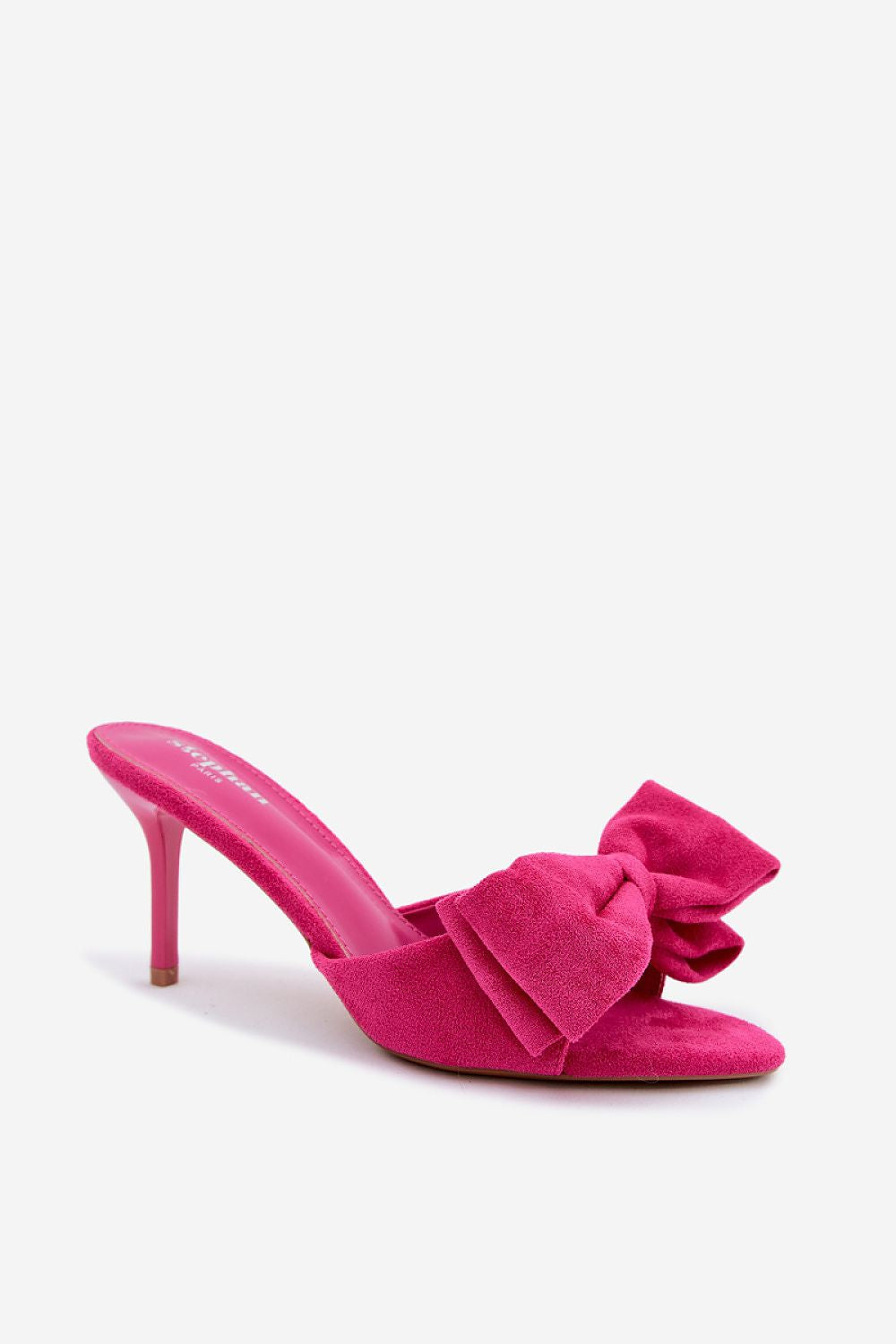 Pink high-heeled shoe with a large bow on a white background