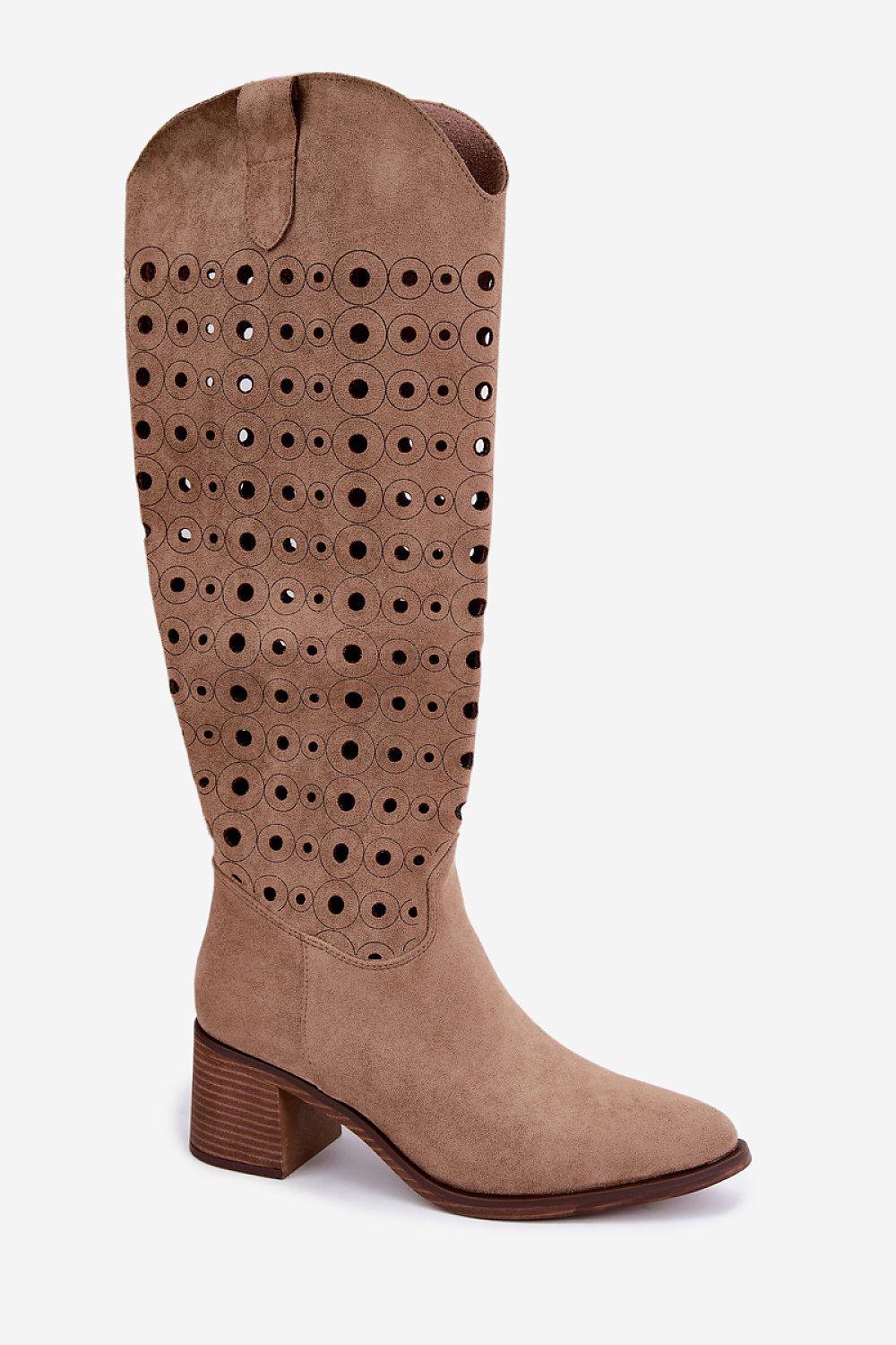 A single knee-high cowboy boot in taupe brown suede, featuring a decorative pattern of circular cutouts on the shaft and a stacked block heel, shown against a plain light gray background.