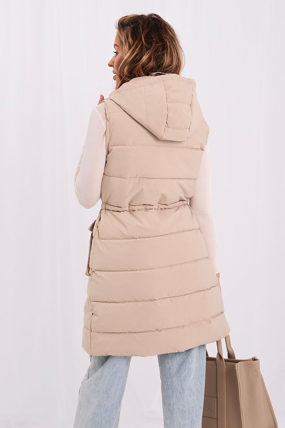 Beige longline quilted gilet with concealed zip and snap-button front flap rear view
