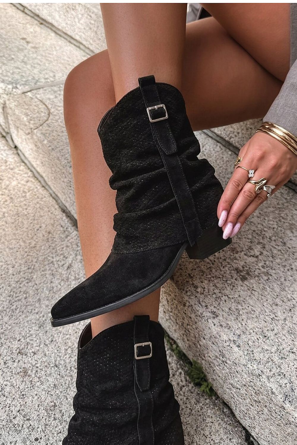 Black faux-suede women's cowboy boots with turned-down shaft and tapered heel