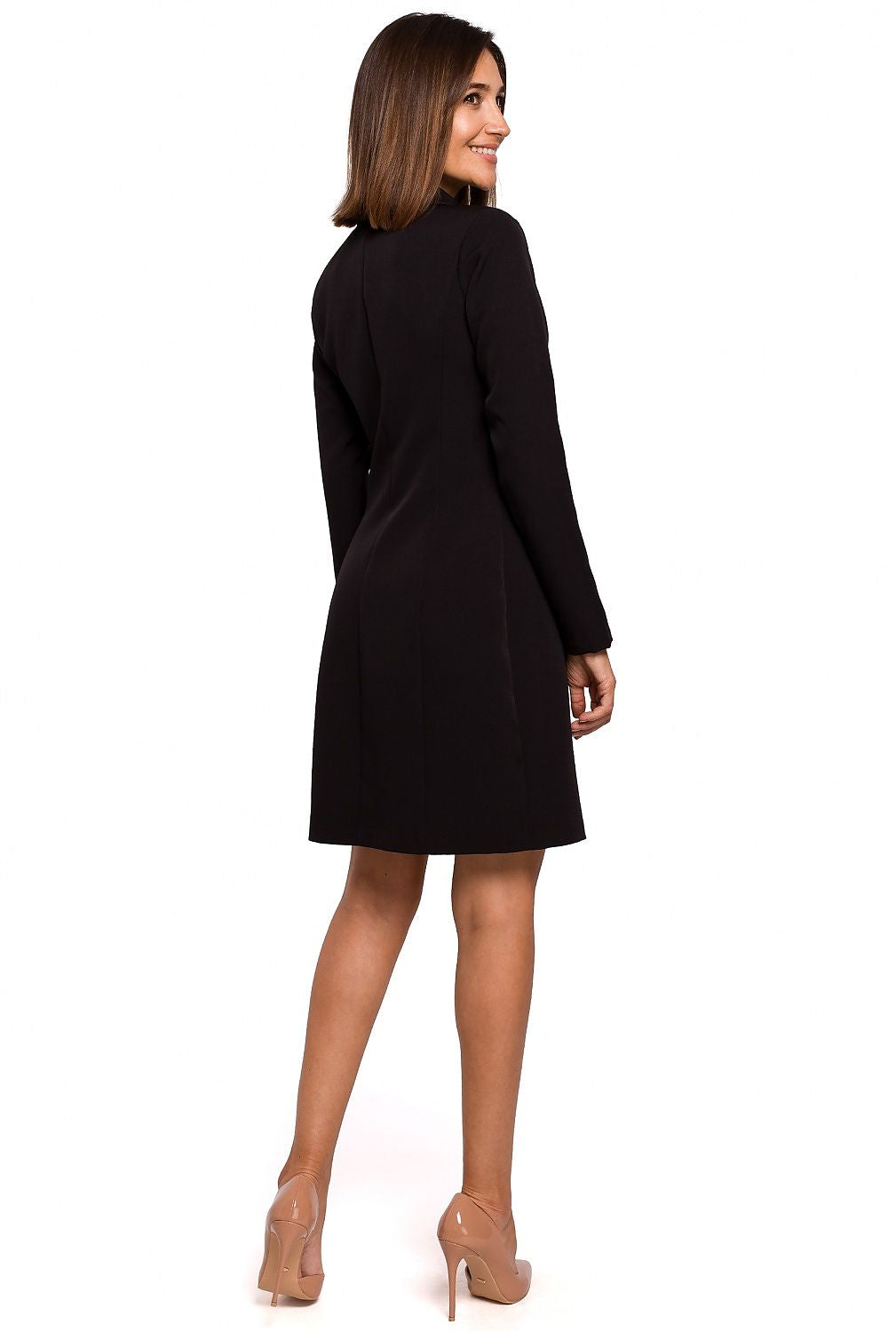 Woman wearing a black dress on a white background