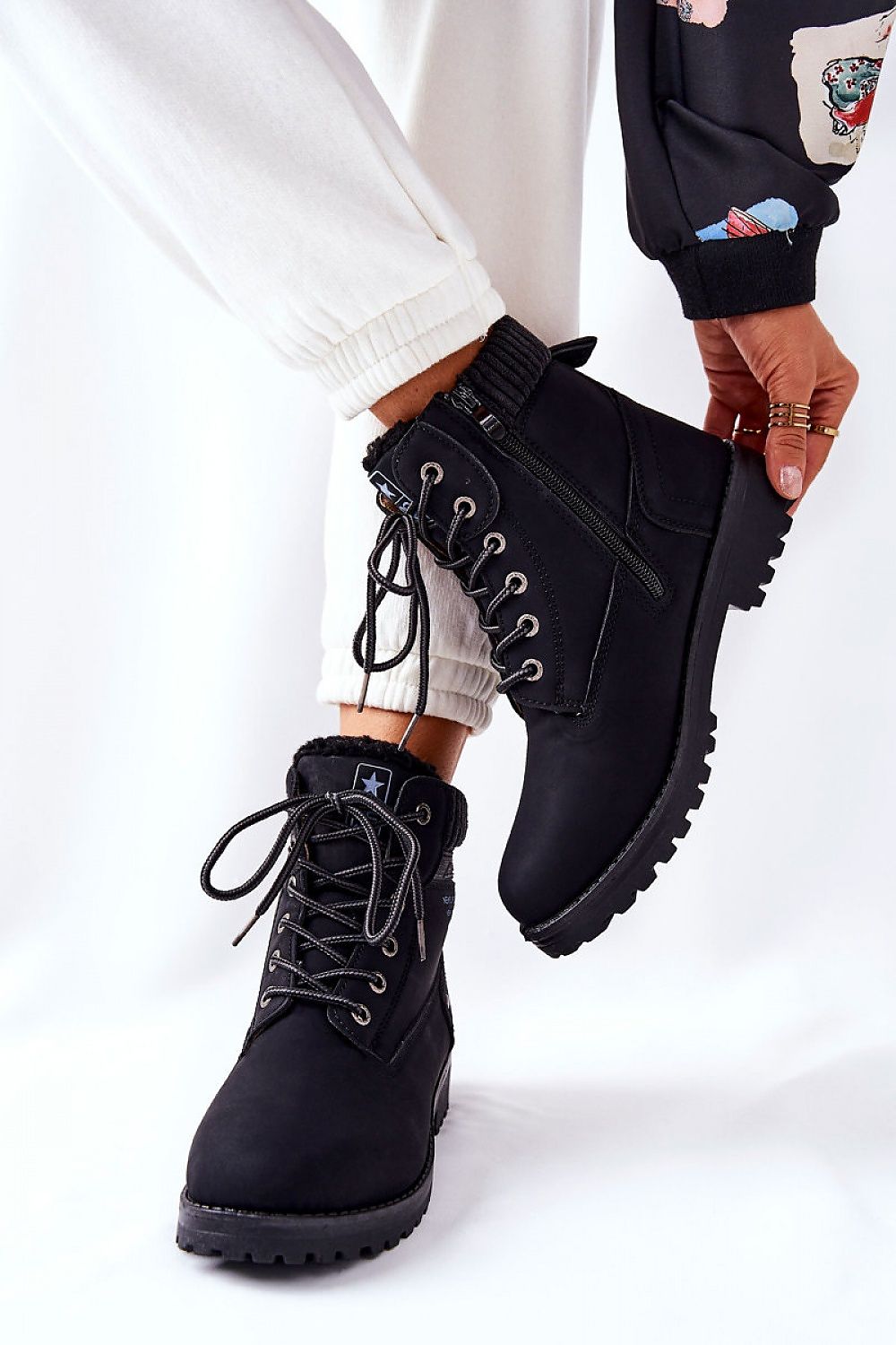 Black trapper boots in eco-leather, side view showing zipper and laces