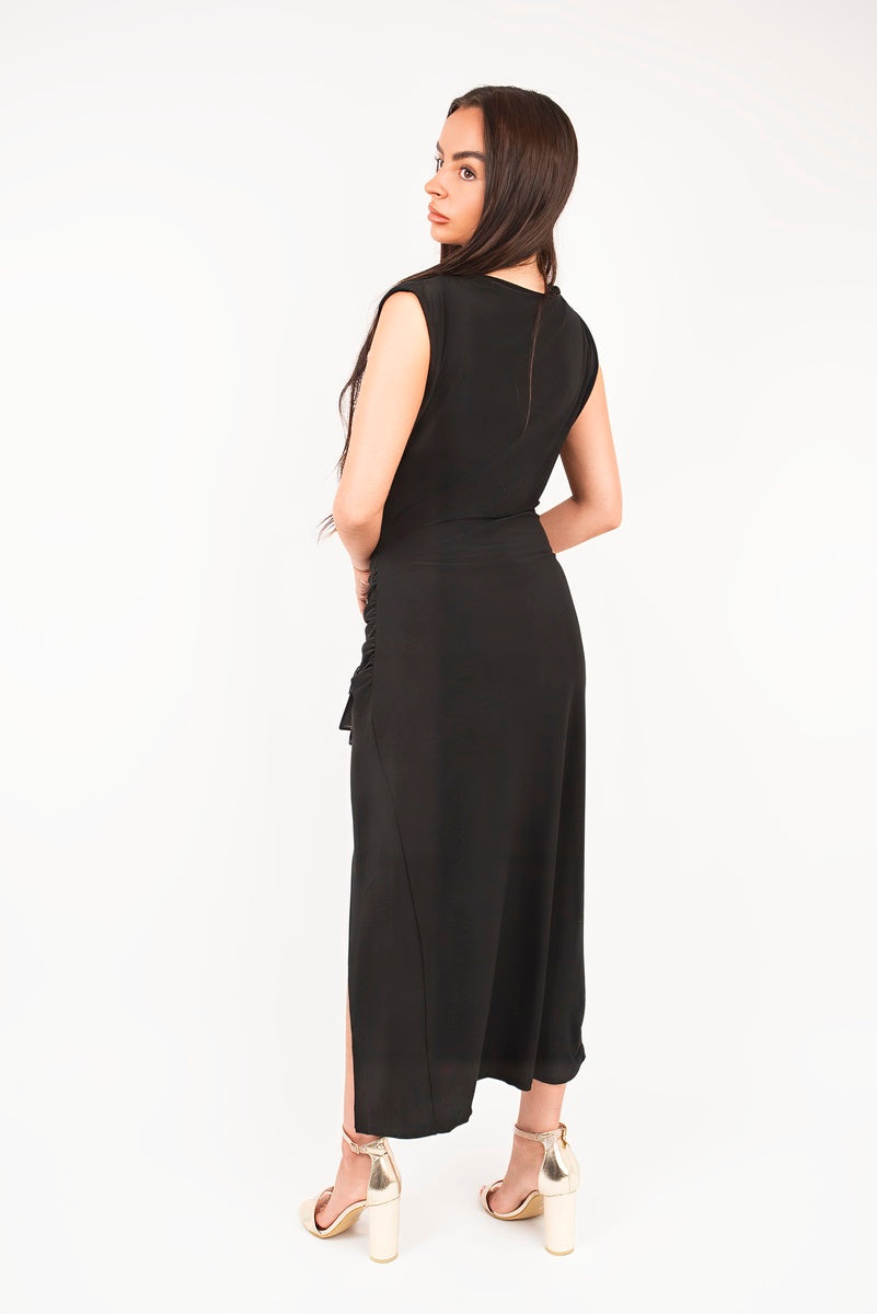 “Black sleeveless drape ring detail split midi dress, back view”