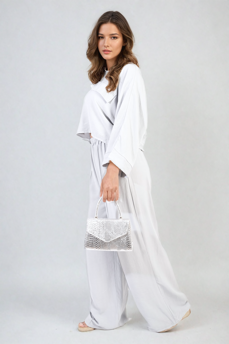 Close-up of grey co-ord fabric and oversized fit.