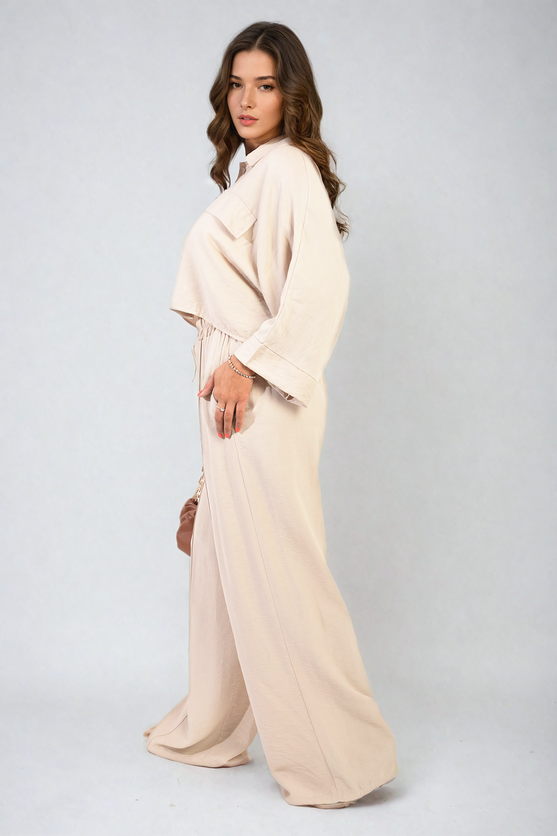 Side view of beige co-ord showing relaxed fit.