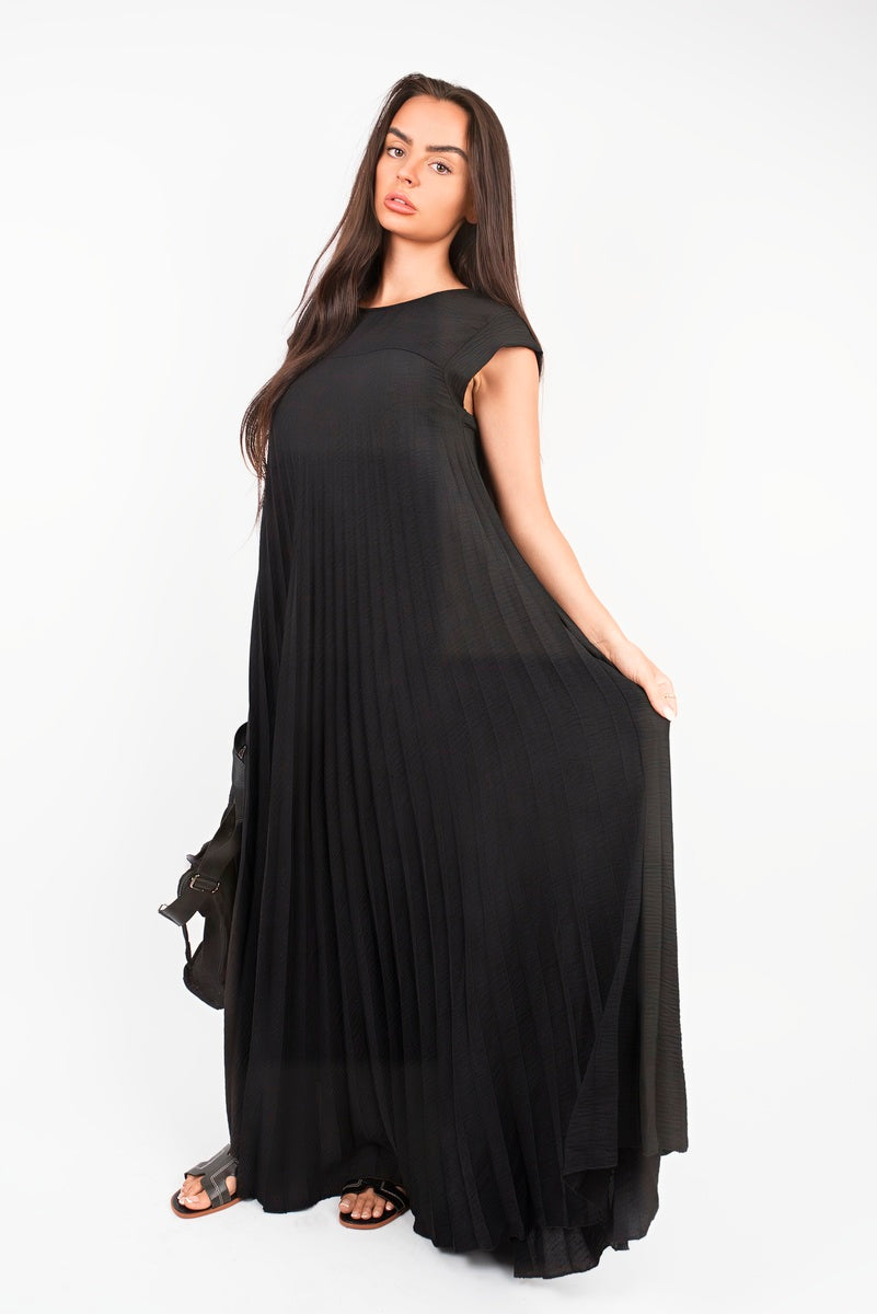 “Black pleated cap sleeve maxi dress, side view”