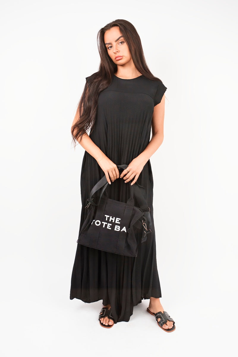 “Black pleated cap sleeve maxi dress, front view”