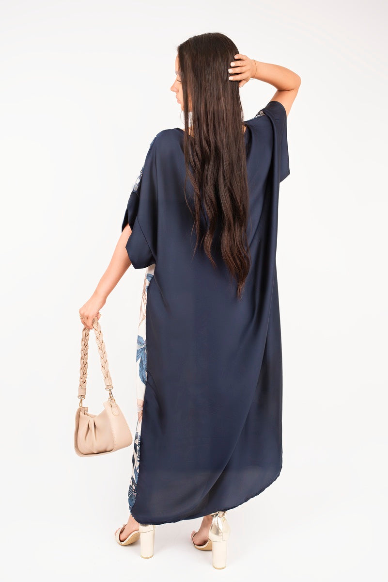 “Navy oversized batwing maxi dress with tropical print, back view”