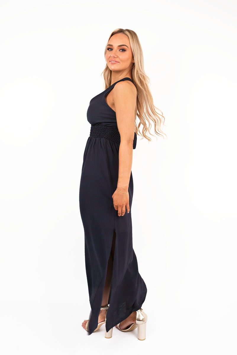 “Black cross back maxi dress with ruched waist, side view”