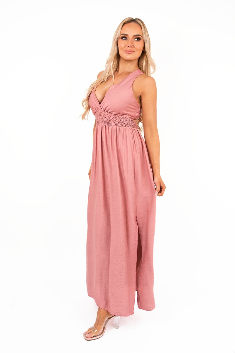 “Pink cross back maxi dress with ruched waist, side view”