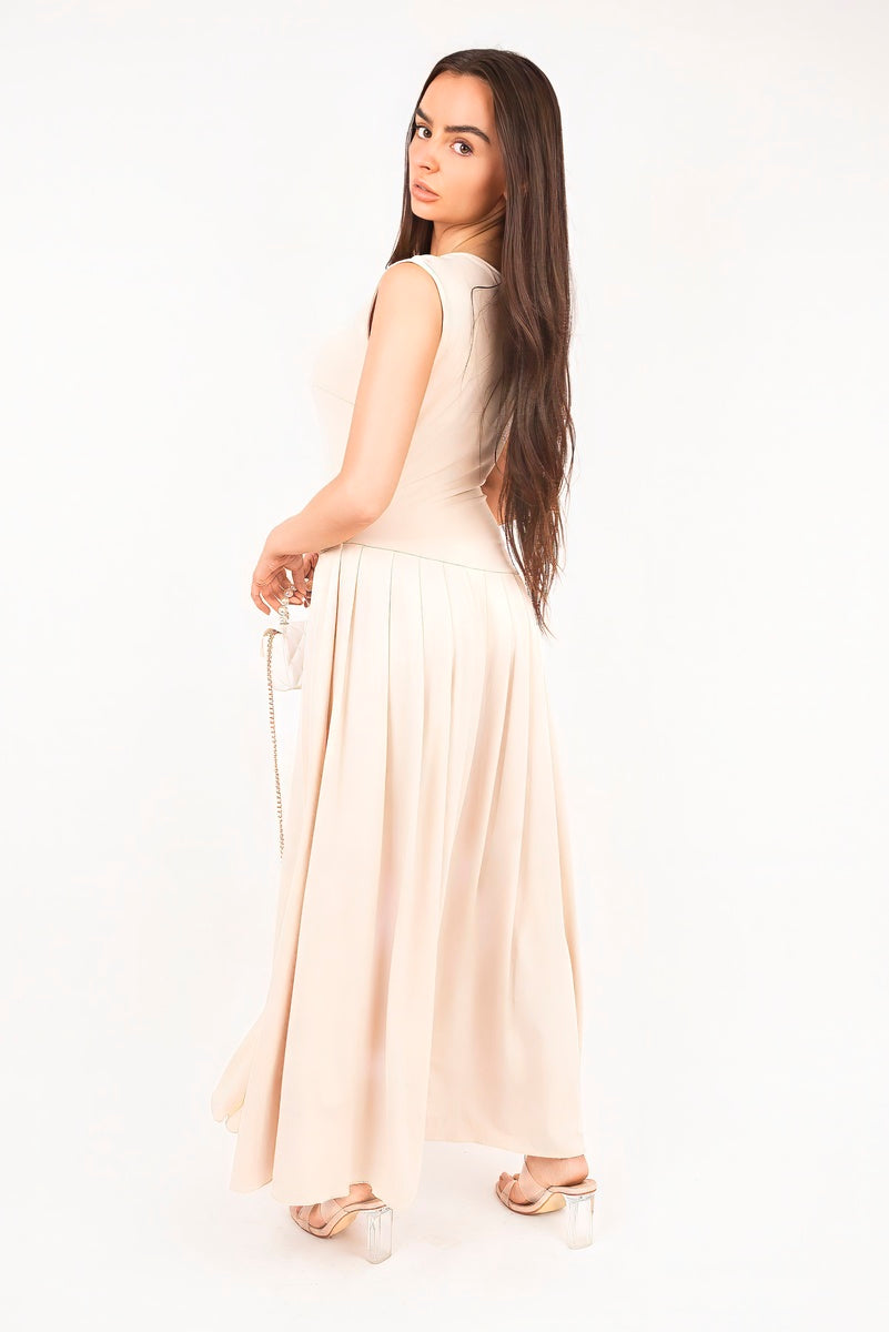 “Beige short sleeve pleated maxi dress, back view”