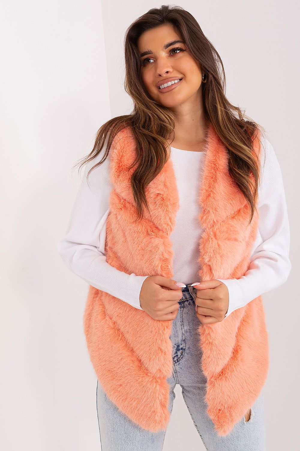 Women's orange faux fur gilet with practical pockets