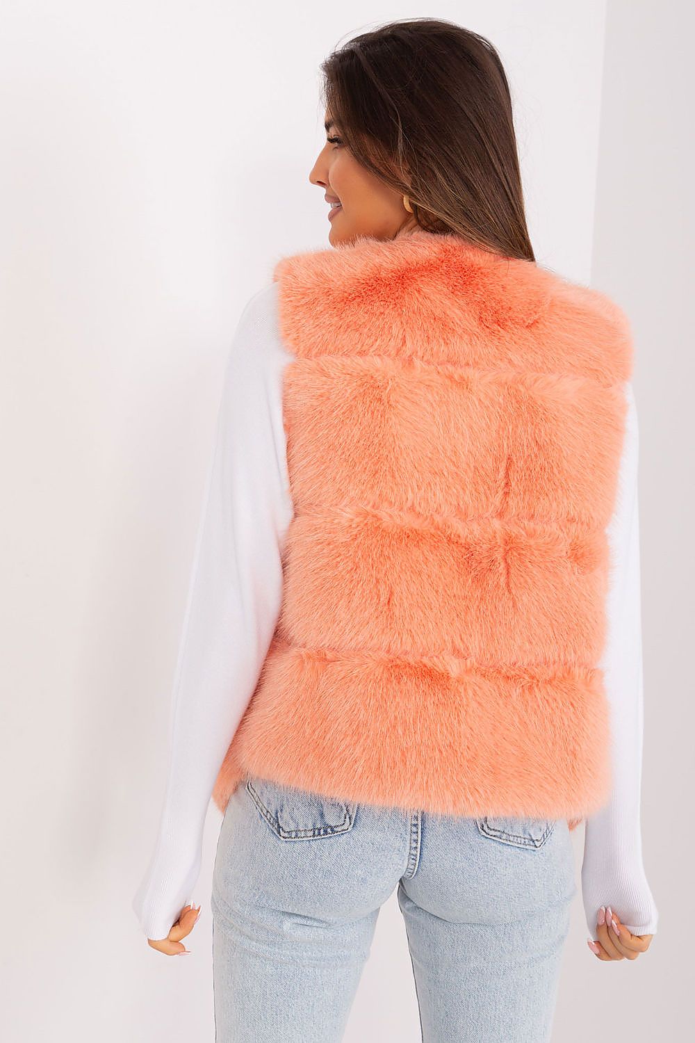 Women's orange faux fur gilet with practical pockets-rear view