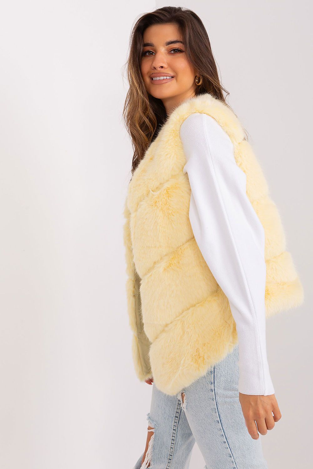 Women's yellow faux fur gilet with practical pockets- side view
