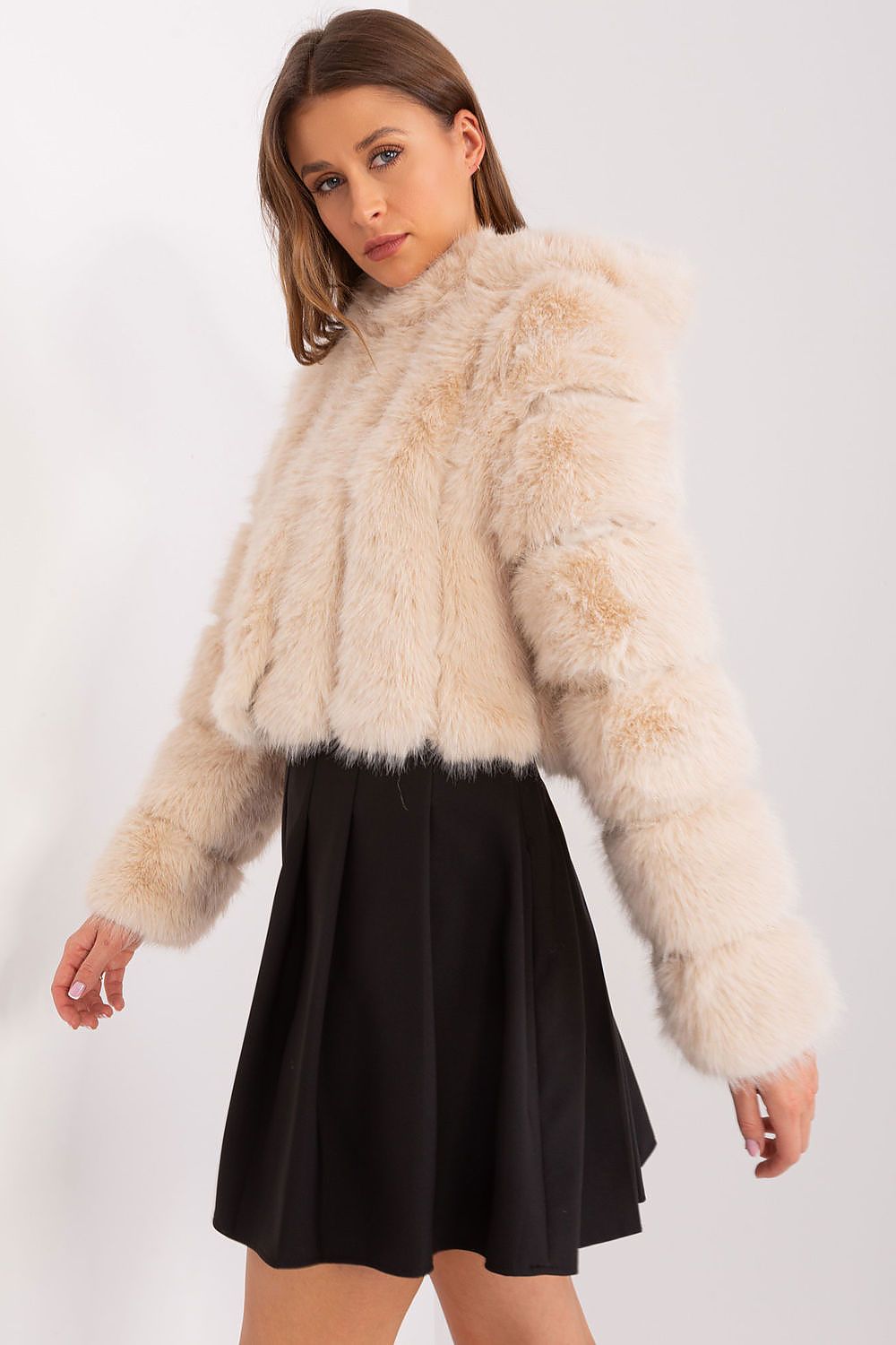 Women's beige hooded faux fur jacket with long sleeves and short modern fit side view