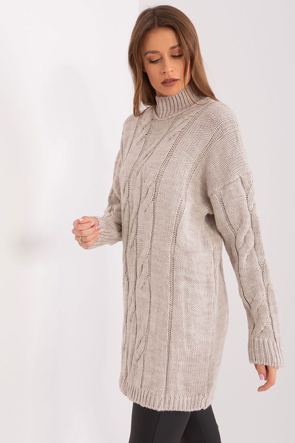 Detailed view of beige turtleneck collar and smooth variegated finish.