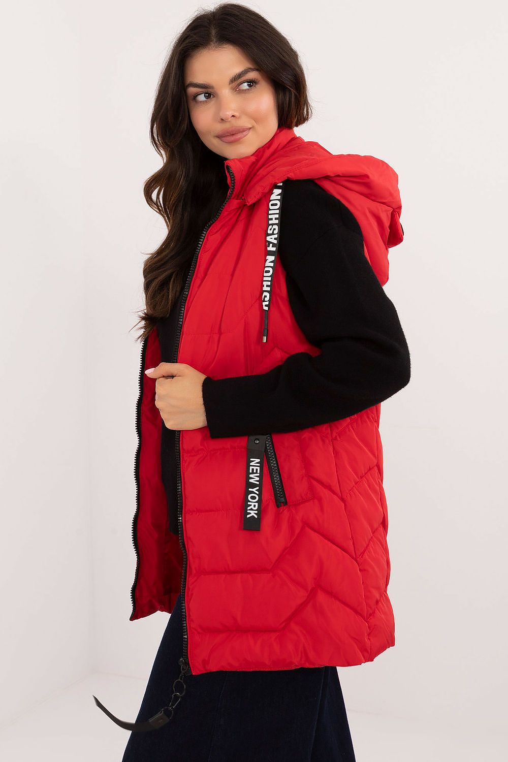  Women's red quilted longline gilet with hood and zip fastening.