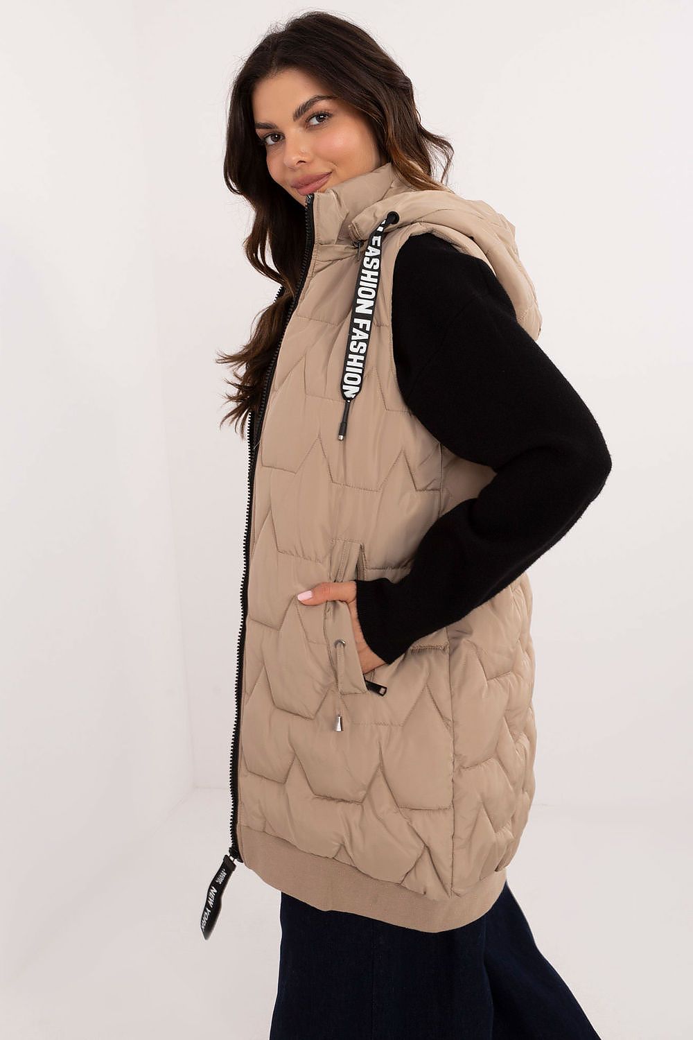 Beige quilted knee-length vest with detachable hood.
