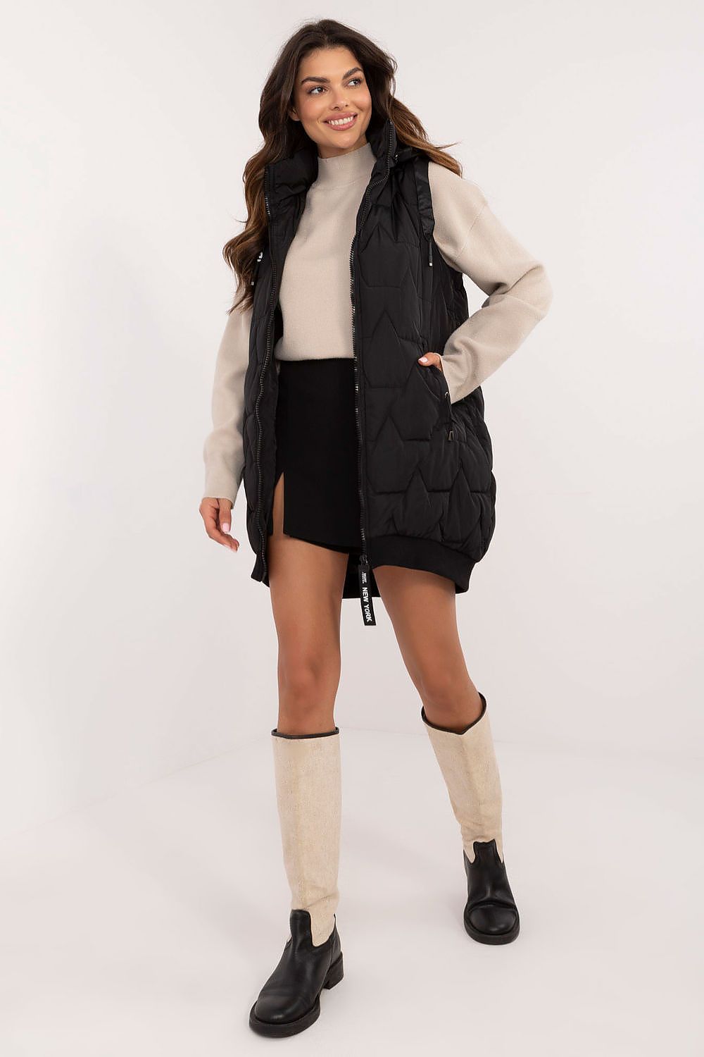  Black long quilted vest for women with detachable hood.
