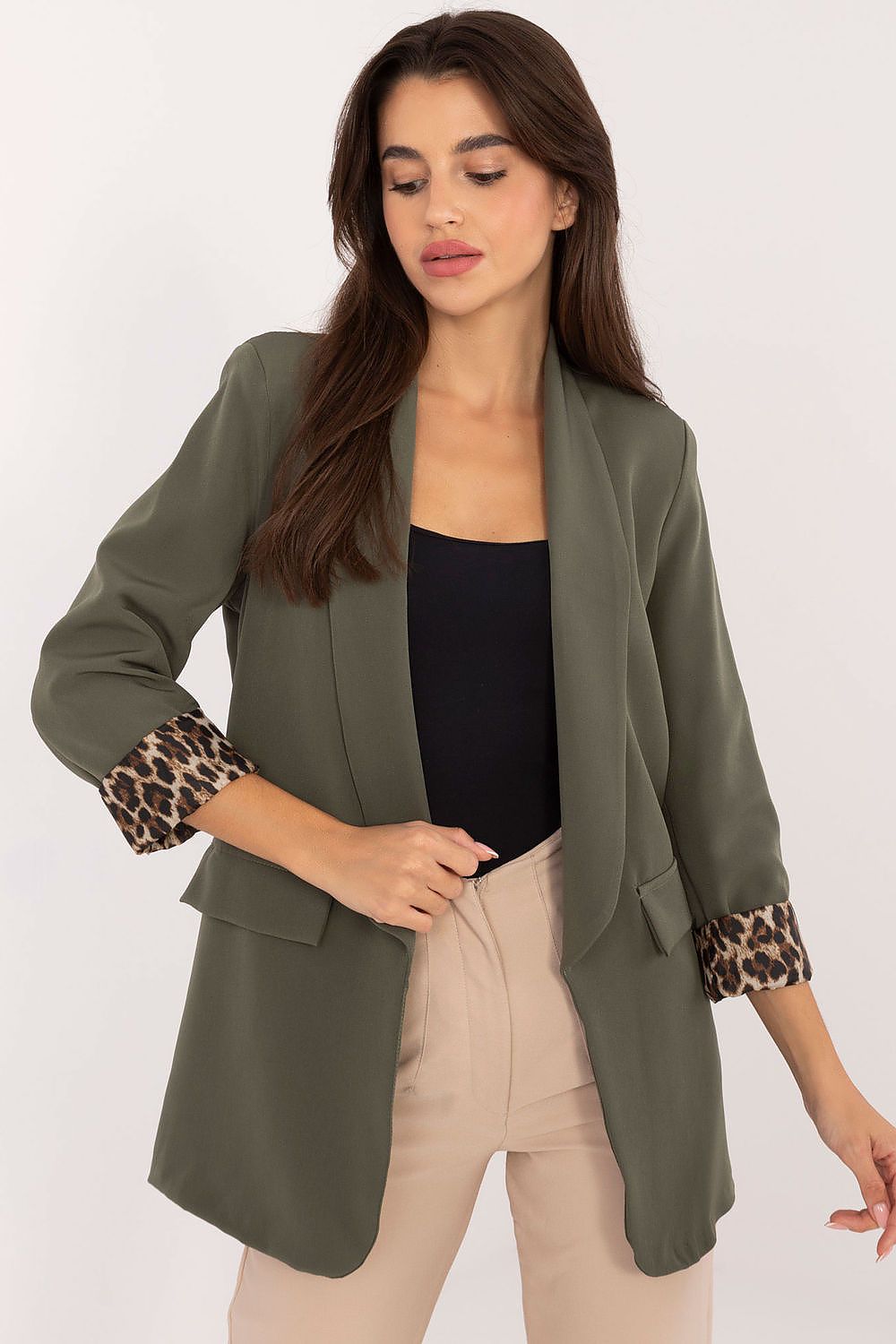 Front view of Elise Women’s green elegant casual jacket with lapels and smooth texture.