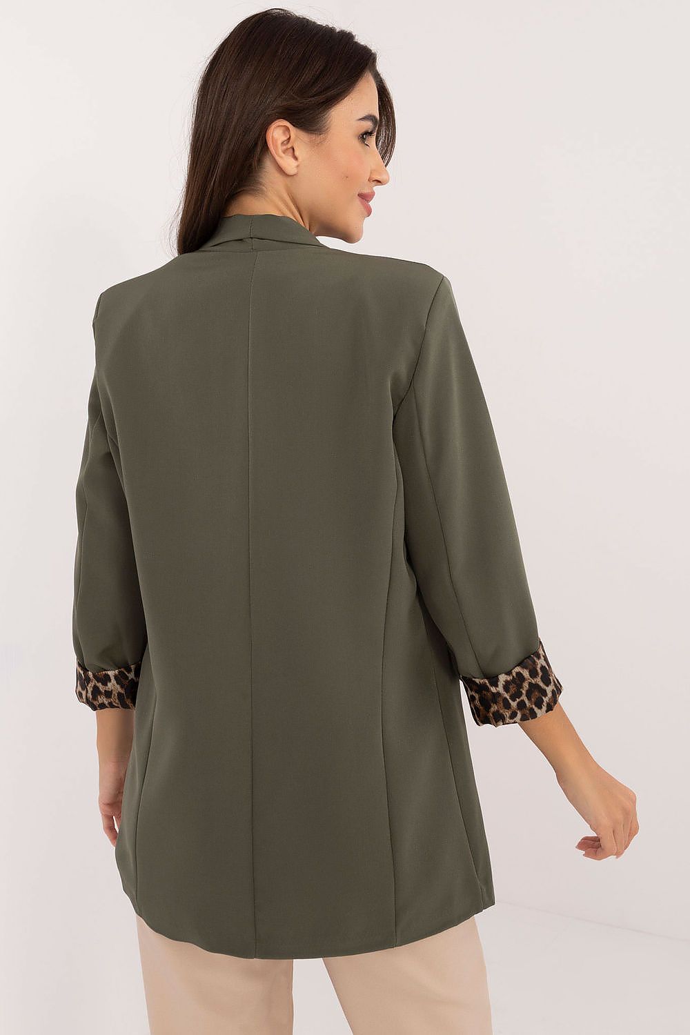  Back view of Elise green jacket highlighting classic, everyday design.